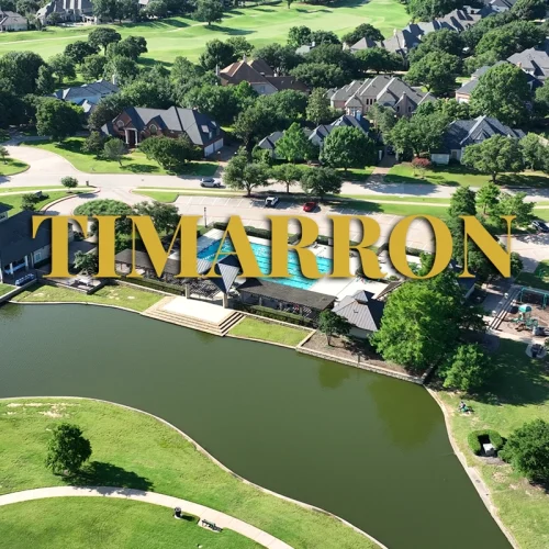 Timarron Southlake aerial view with golf course, pond, and community pool